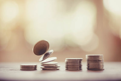 Close-up of coins on table