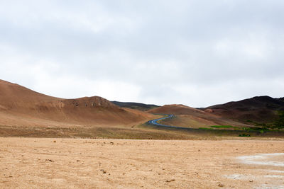 Scenic view of desert against sky