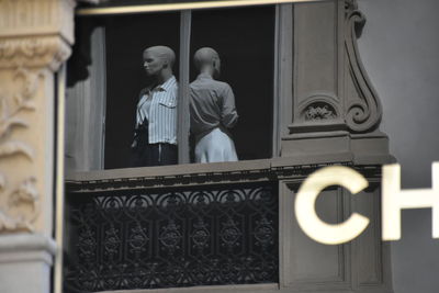 Low angle view of statue against building