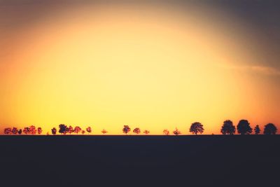 Scenic view of landscape at sunset