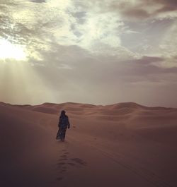 Scenic view of desert against sky