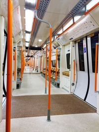 Empty alley along buildings