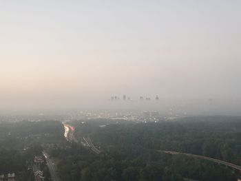 Aerial view of cityscape against sky