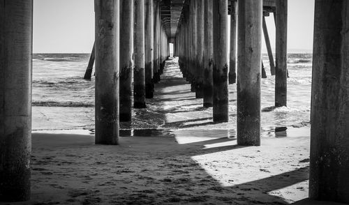 View of wooden pier on beach