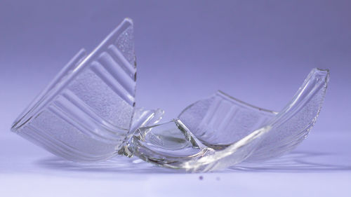 Close-up of glass over white background