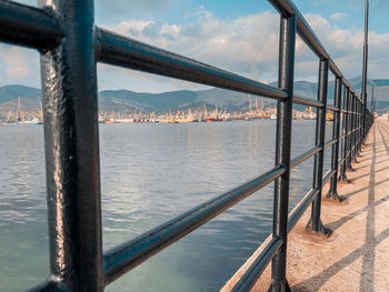 Bridge over sea against sky