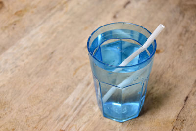 High angle view of drink in glass on table