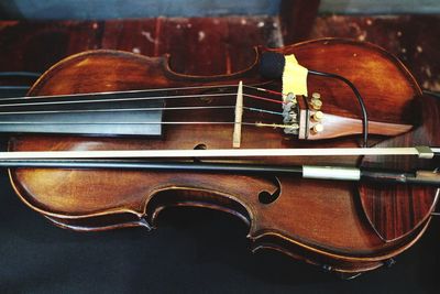 Close-up of guitar on table