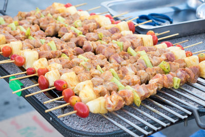 Close-up of meat on barbecue grill