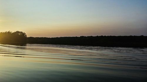 Scenic view of sea at sunset