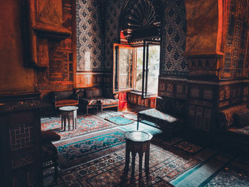 Wooden tables and chairs in old palace