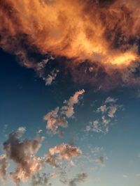 Low angle view of clouds in sky during sunset