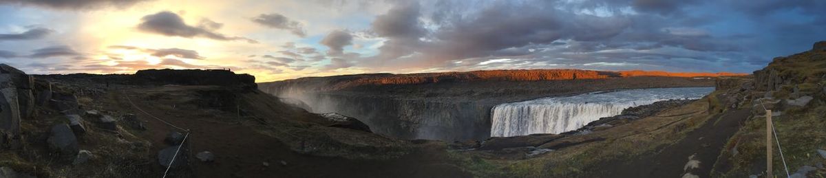 Panoramic shot of waterfall against sky