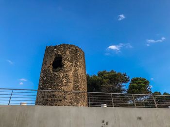 Low angle view of fort against blue sky