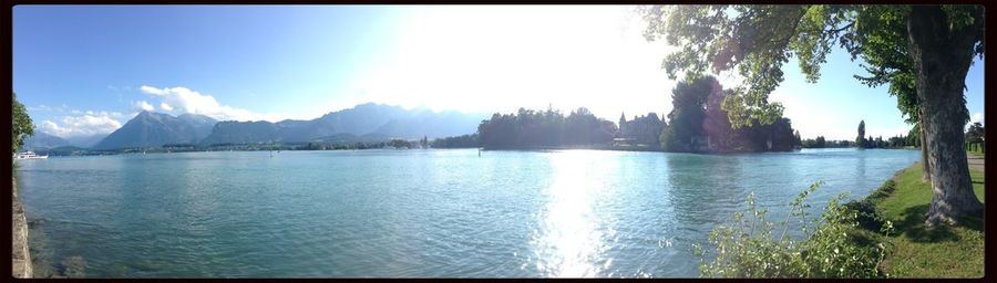 Scenic view of lake with mountains in background