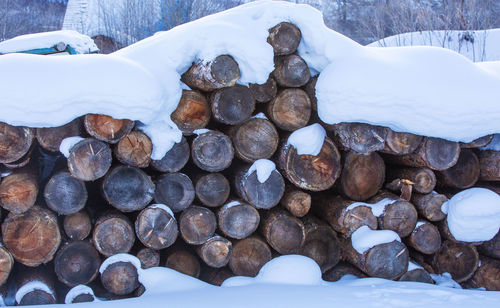 Background of firewood stacked in the cut wood, timber, firewood textured for background
