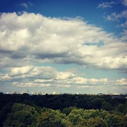 Scenic view of landscape against cloudy sky