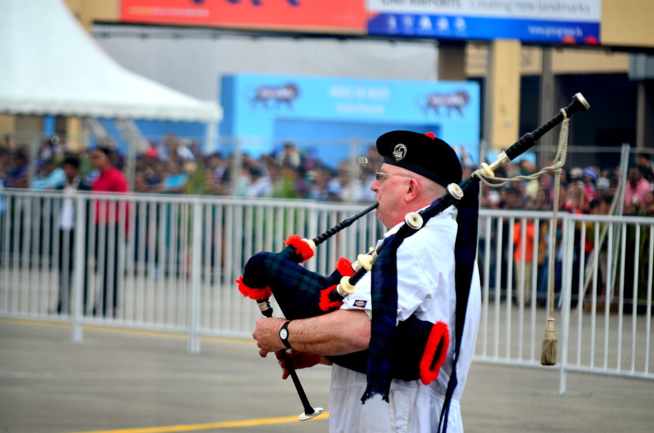 Playing bagpiper