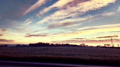 Scenic view of dramatic sky during sunset