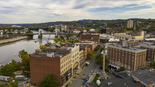 High angle view of river amidst buildings in city