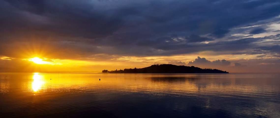 SCENIC VIEW OF DRAMATIC SKY OVER SEA