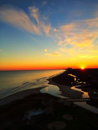 Scenic view of sea at sunset