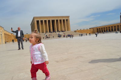 Cute girl at footpath at historic site