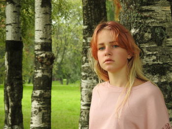 Portrait of cute girl in forest