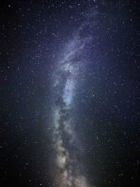 Low angle view of stars in sky at night