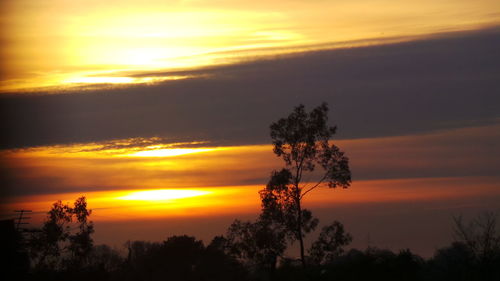 Scenic view of dramatic sky during sunset