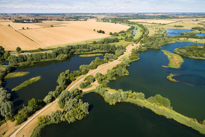 Aerial view of agricultural landscape against sky