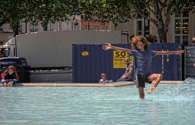 People enjoying in swimming pool