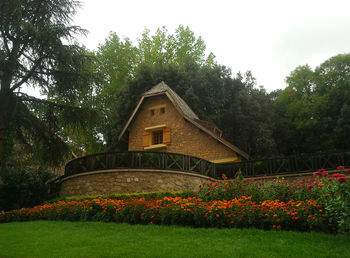 View of illuminated house against sky at night