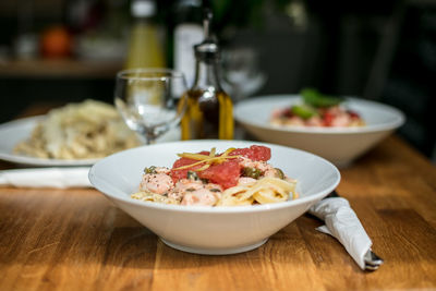 Close-up of pasta served on table