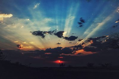 Scenic view of dramatic sky during sunset