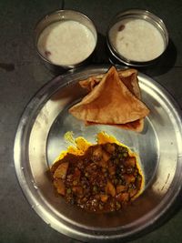 High angle view of food served on table