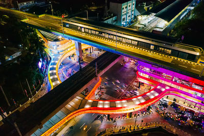 High angle view of light trails on road at night