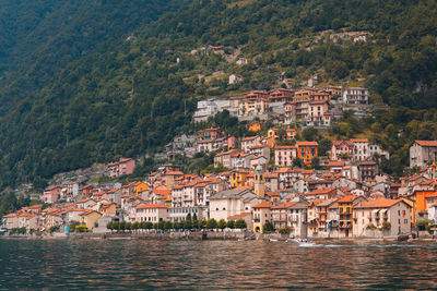 Aerial view of townscape by sea