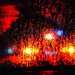 Defocused image of illuminated lights at night