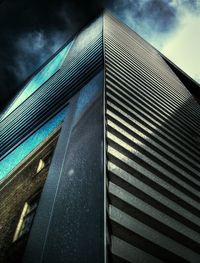 Low angle view of modern building against sky