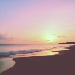 Scenic view of sea at sunset