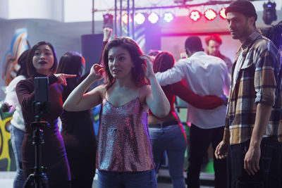 Group of friends standing in party