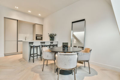 Empty chairs and tables at home