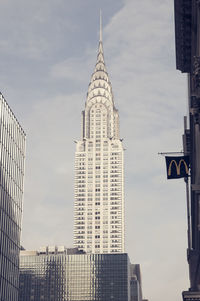 Low angle view of skyscrapers against sky