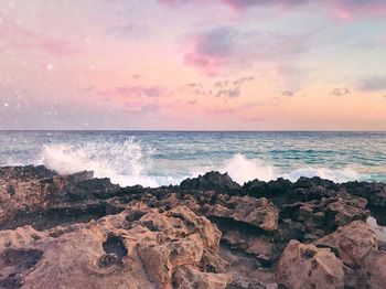 Scenic view of sea against sky during sunset