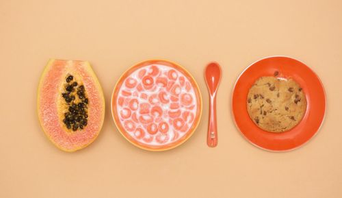 Close-up of food on table against white background