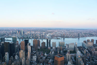 High angle view of modern buildings against sky in city