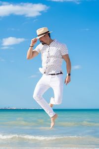 Man jumping on beach