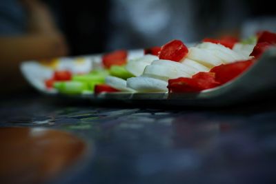 Close-up of fruits in plate on table