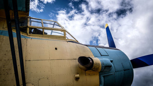 Low angle view of airplane against sky